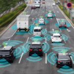 artist's rendering of connected vehicles on a highway